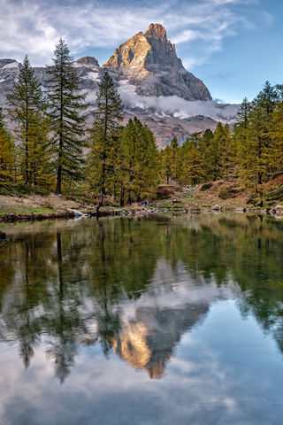 The Matterhorn (Cervinia) at sunset reflected in Lake Blue