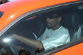 Snoop Dogg in HEMI Orange Dodge Challenger.jpg